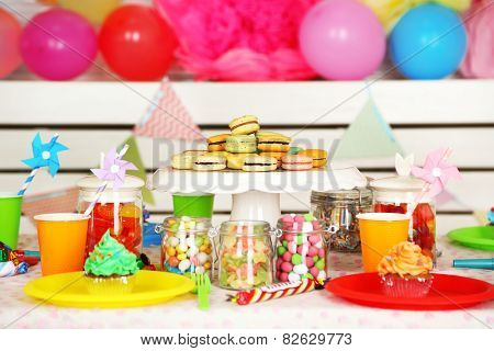 Prepared birthday table with sweets for children party