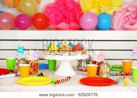 Prepared birthday table with sweets for children party