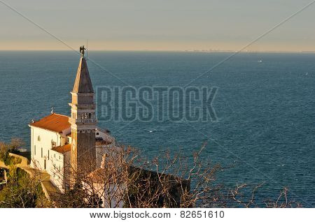 Saint George church and bell tower at city of Piran in Istria