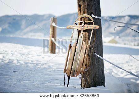 Vintage Sled in Snow Scene
