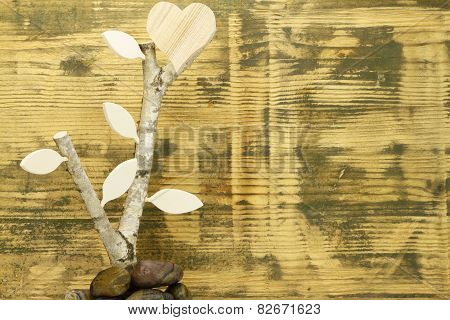 Background spruce wood with wooden heart