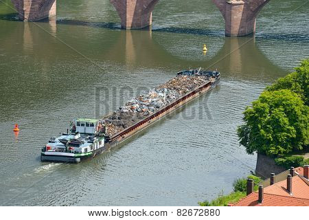 Barge transports waste on the river