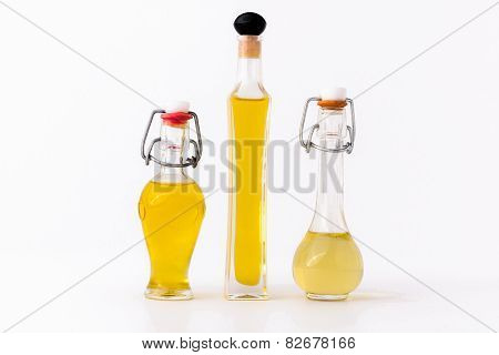 three bottles of olive oil