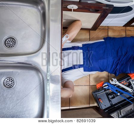 Handyman Lies On The Floor
