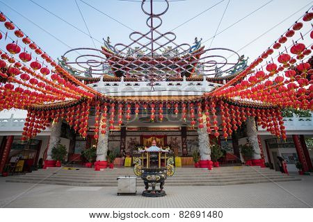 KUALA LUMPUR, MALAYSIA - FEBRUARY 08, 2015: Tourists visit the scenic Thean Hou Temple with up hundreds of lanterns hung across the courtyard. This is in preparation for the coming Chinese New Year.