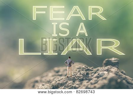 Concept of  with a person stand in the outdoor and looking up the text over the sky in nature background.