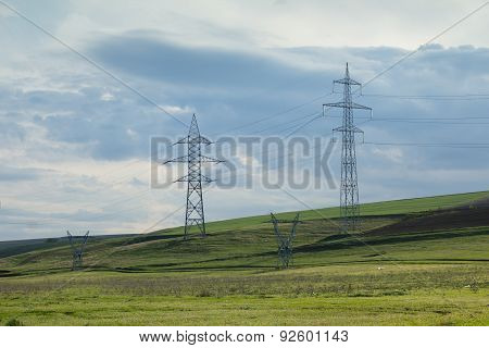 Electrical Poles In A Field
