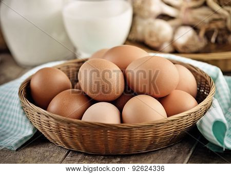 Easter Egg In A Basket On Wodden Table