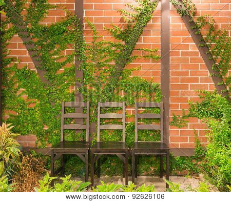 Three Wood Desk Chair In Garden