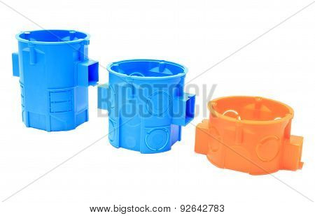 Orange And Blue Electrical Boxes On White Background
