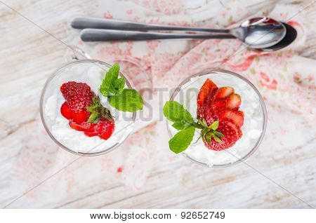Strawberries In Jelly Topped With Whipped Cream