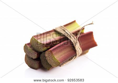 Bunch Of Fresh Rhubarb Isolated On White Background
