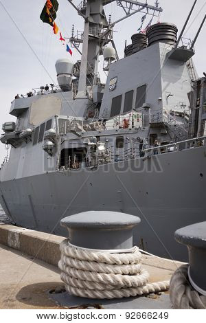 STATEN ISLAND, NY - MAY 20 2015: Low angle view of the guided-missile destroyer USS Barry (DDG 52) moored during Fleet Week NY at Sullivans Pier.