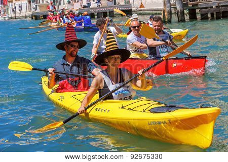 Oarsmen in the Venice Vogalonga regatta, Italy.
