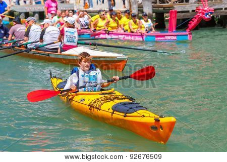 Oarsmen in the Venice Vogalonga regatta, Italy.