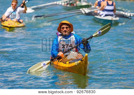 Oarsmen in the Venice Vogalonga regatta, Italy.