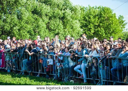 Crowd of people watching Historical reenactment of Boudica's re