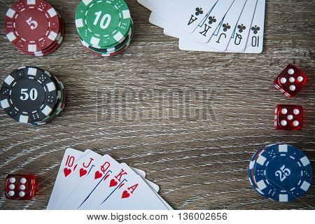 Gambling chips frame on Blue card table background