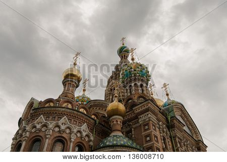 Church of the Savior on the Blood of Christ or the Church of the Saviour on Spilled Blood from the bottom up on a background of clouds.