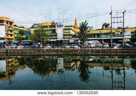 NAKHON PATHOM THAILAND - MAY 08 2016: fresh market near the canal and Phra Pathom Chedi.
