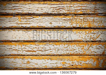 Old boards with flaky coat of paint.