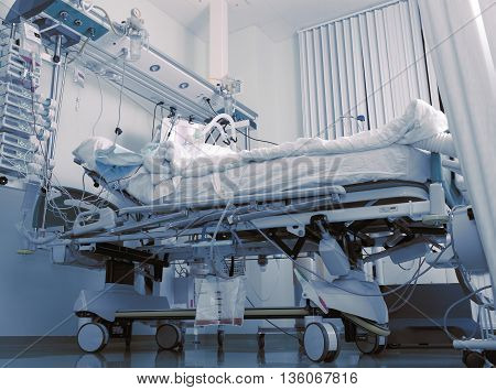 Comatose patient in the intensive care ward