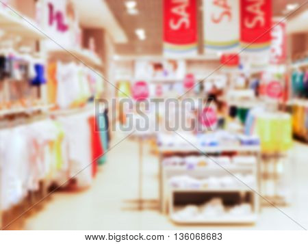 Abstrackt blurred of kids wear of departament store background with bokhe