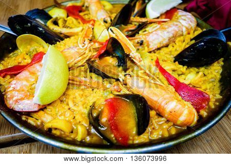 Prawn with rice - closeup of prawn with rice - traditionnal spanish food paella