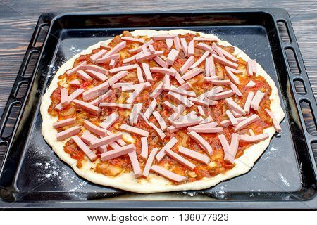 The preliminary stages of the pizza. Ingredients for cooking