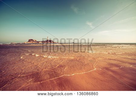 Ninh Chu Beach, Phan Rang, Vietnam, Beach scene and Lignthouse