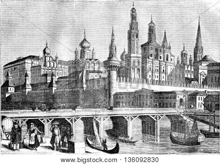 View of the Kremlin and the wooden bridge in Moscow, vintage engraved illustration. Magasin Pittoresque 1836.
