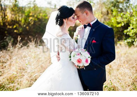 Close Up Portrait Of Young Stylish Weding Couple