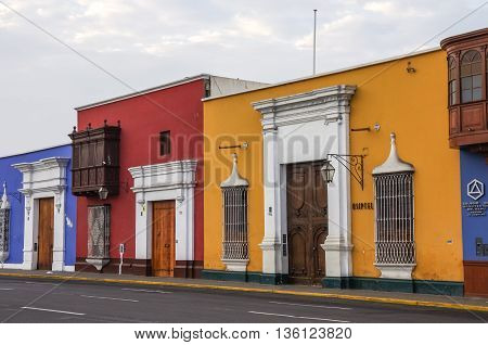 Trujillo, Peru - January 11, 2014: Colorful colonial houses in Trujillo downtown Peru