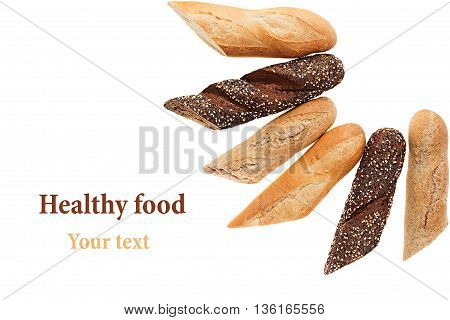 Cut baguette bread of different varieties on a white background. Rye wheat and whole grain bread. Isolated. Decorative frame of bread. Food background. Copy space.