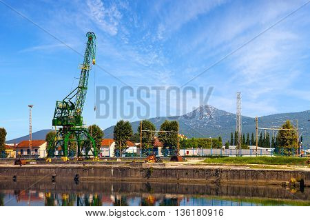 Small crane on the edge of the Neretva river in Metkovic Croatia.