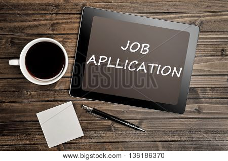 The words Job apllication on tablet pc