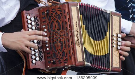 SELARGIUS, ITALY - September 8, 2013: Former marriage Selargino - Sardinia - Accordion buttons