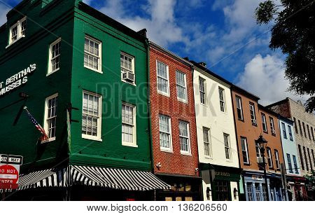 Baltimore Maryland - July 22 2013: A mix of 18th and 19th century buildings now house shops pubs and restaurants at historic Fells Point