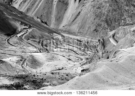 Aerial view of Zigzag road - famously known as jilabi road at old route of Leh Srinagar Highway Ladakh Jammu and Kashmir India. Beautiful black and white stock image.