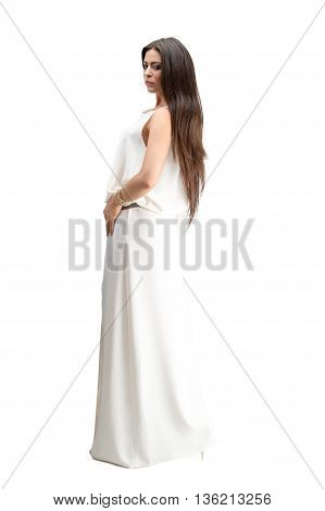 fashion model posing in studio, she wear evening dress
