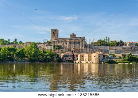 San Salvador Cathedral of Zamora and acenas (water mills) view from Duero river. Castilla y Leon Spain.