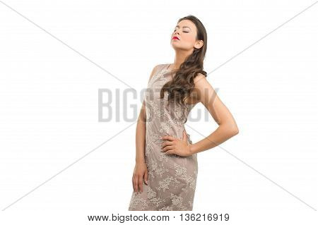 beautiful young girl posing to camera in fashion dress
