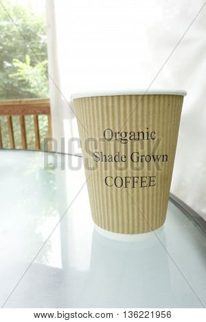 Coffee cup with Organic Shade Grown text