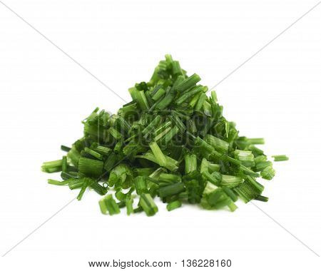 Pile of chopped green onion scallions isolated over the white background