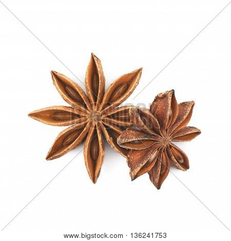 Pile of multiple Chinese star anise seeds, composition isolated over the white background