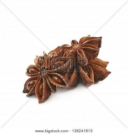 Pile of multiple Chinese star anise seeds, composition isolated over the white background