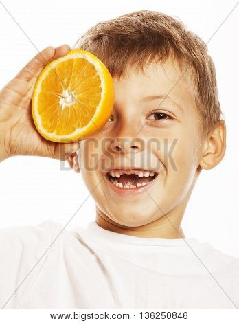 little cute boy with orange fruit double isolated on white smiling without front teeth adorable kid cheerful close up