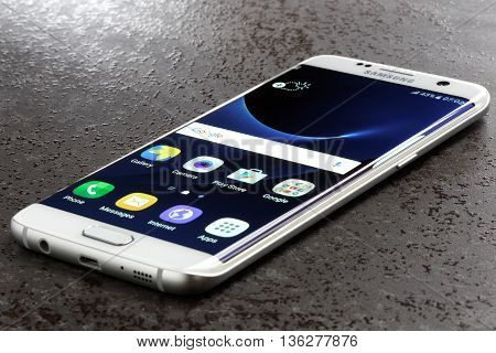 Koszalin, Poland  June 29, 2016: Photo of Samsung Galaxy S7 Edge white pearl. Samsung 7 Edge are new generation smartphone from Samsung. The Samsung S7 Edge is smart phone with multi touch screen