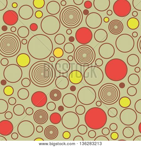 Abstract image with circles in brown, red, yellow.