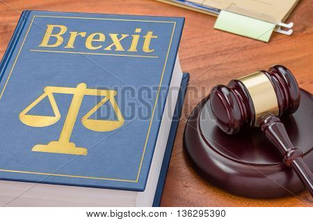 A Law Book With A Gavel - Brexit
